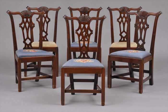 Appraisal: SET OF SEVEN CHIPPENDALE-STYLE CARVED MAHOGANY DINING CHAIRS Comprising six