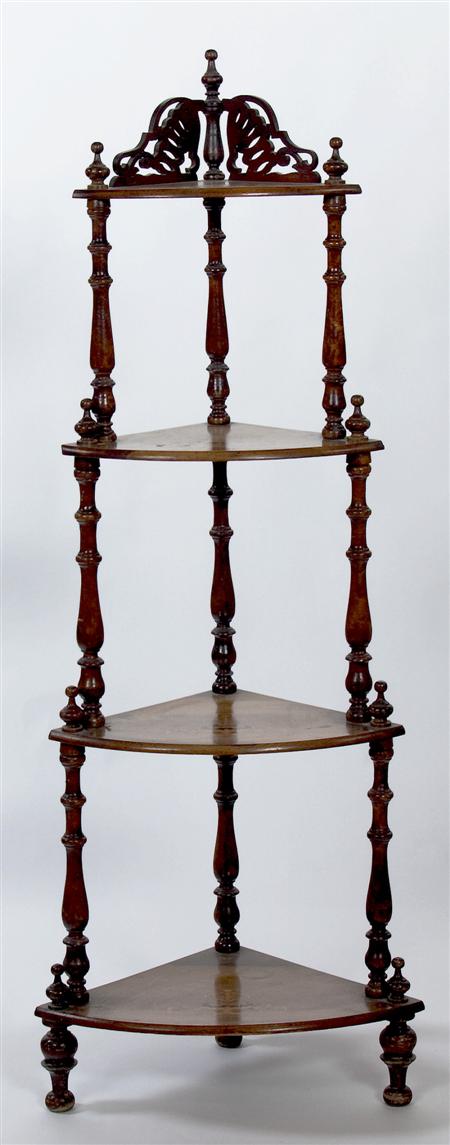 Appraisal: A Victorian walnut and inlaid corner whatnot with four graduated