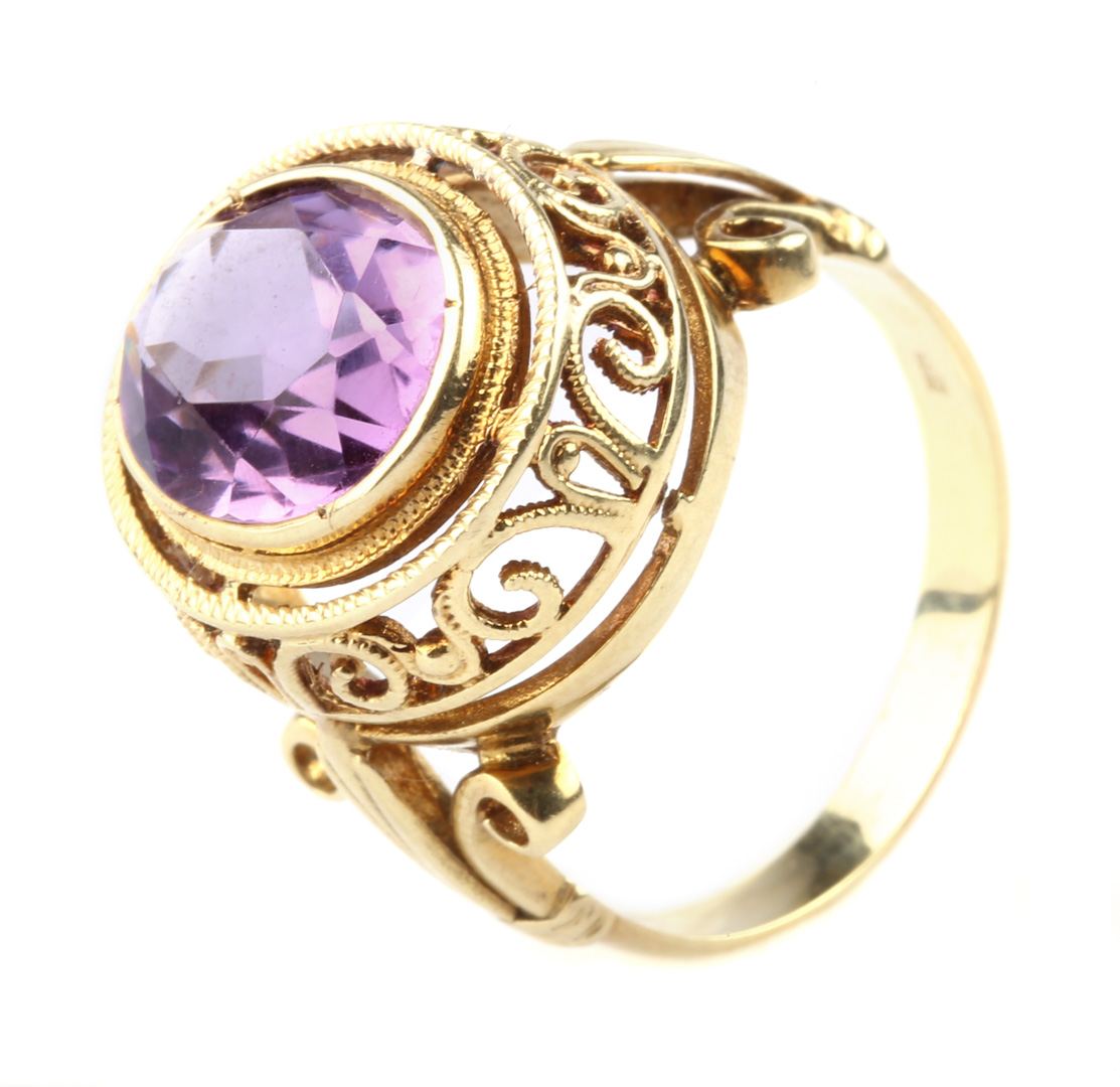 Appraisal: An Amethyst Ring in a Filigree Setting K mounting with