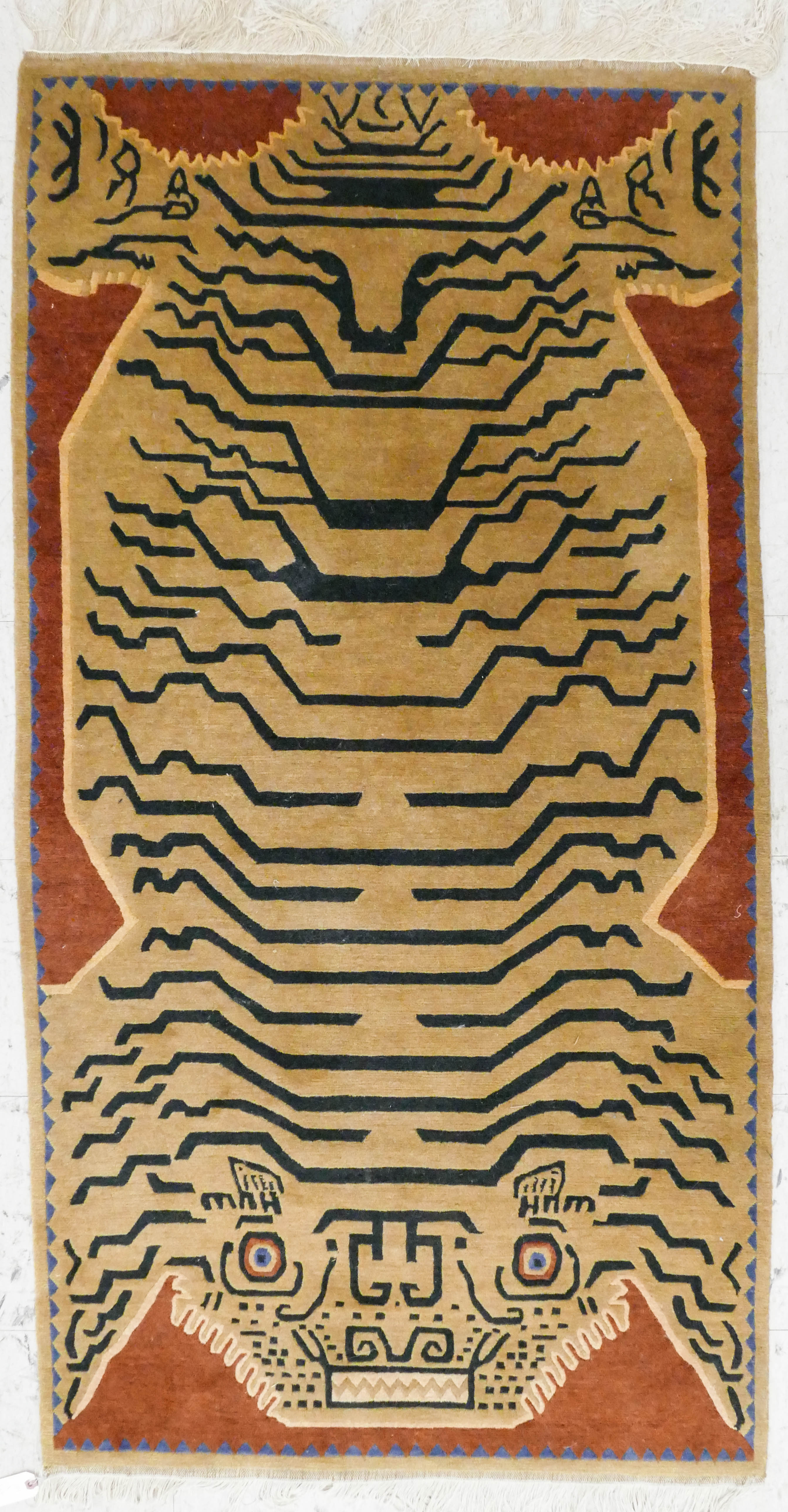 Appraisal: Tibetan or Indian Tiger Wool Scatter Rug Measures x '