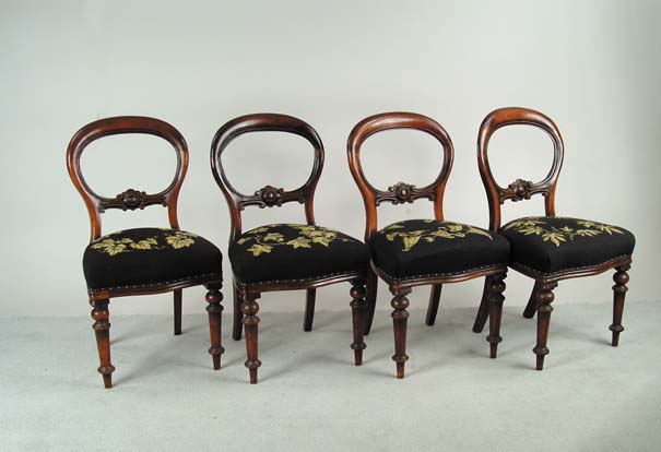 Appraisal: SET OF FOUR REGENCY UPHOLSTERED SIDE CHAIRS Boldly turned front