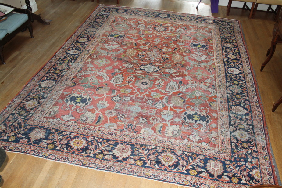 Appraisal: A Ziegler Mahal carpet with floral madder ground centre within