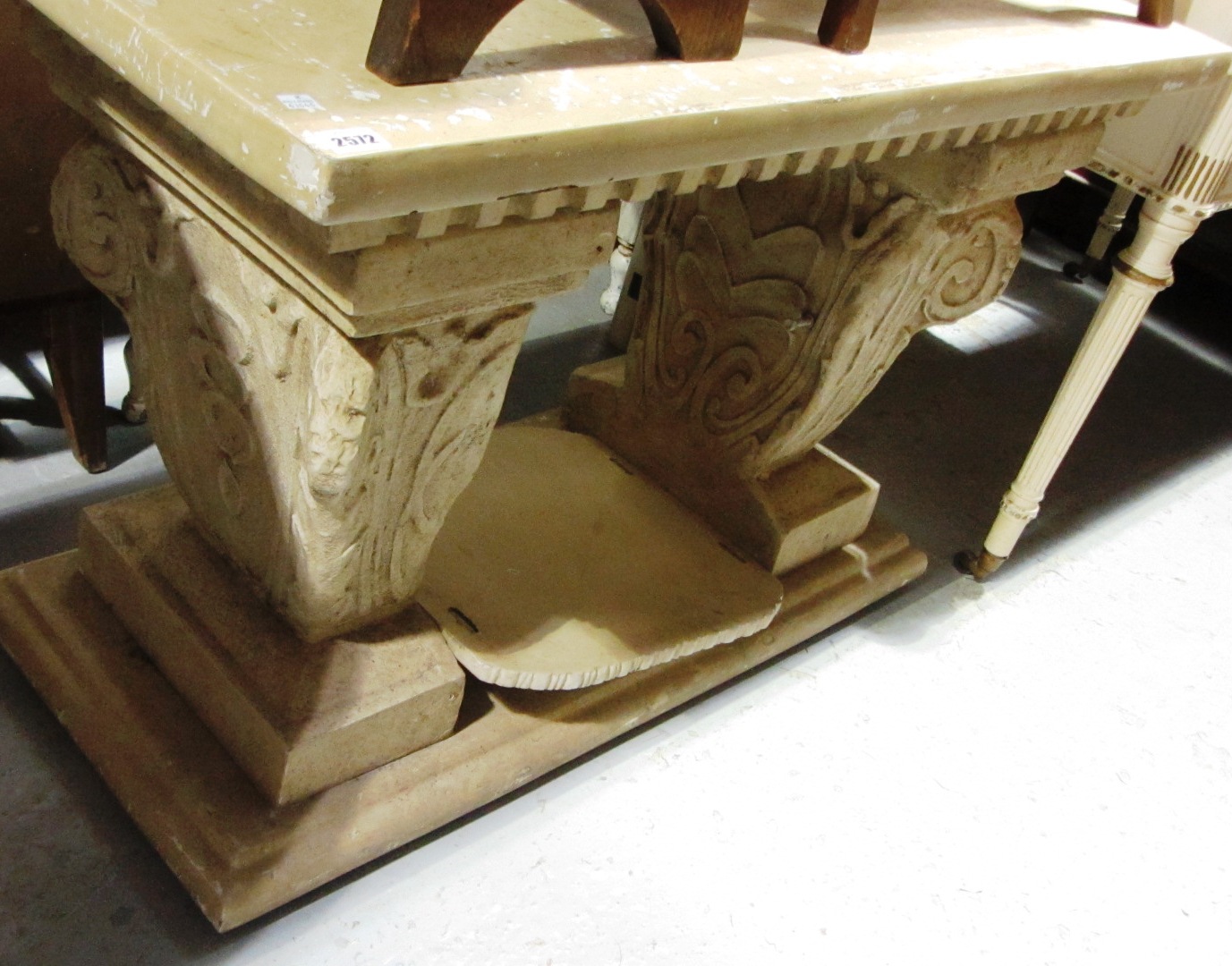 Appraisal: A th century faux stone fibreglass console table