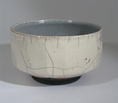 Appraisal: A Raku vase by Inger Rokkjaer faceted form with crackled