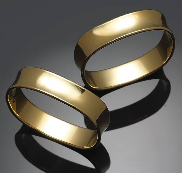 Appraisal: A pair of eighteen karat yellow gold bangles Tiffany amp