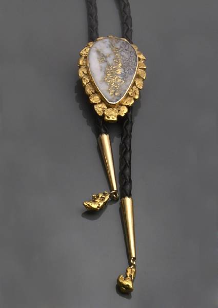 Appraisal: A gold quartz and k gold bolo tie with black