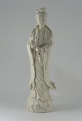 Appraisal: A Chinese blanc de Chine figure of Guanyin standing holding