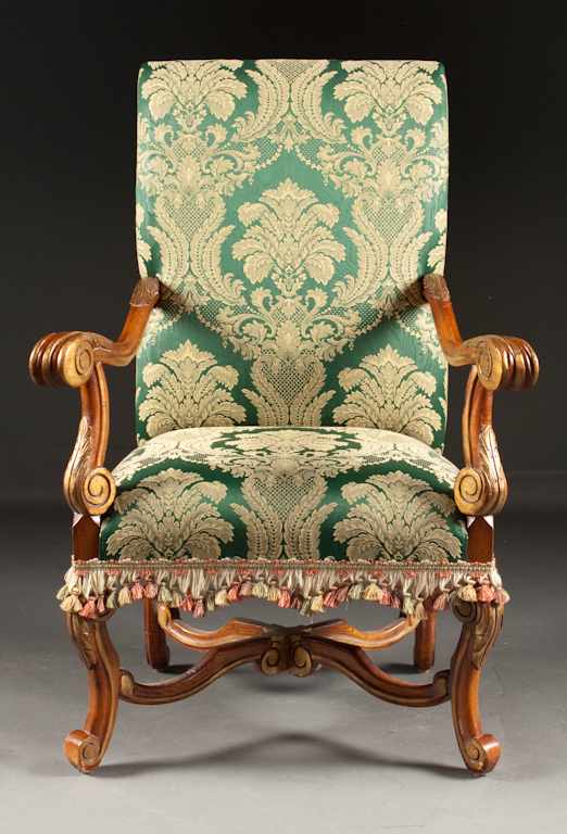 Appraisal: Louis XIV style carved walnut parcel-gilt upholstered armchair with gilt