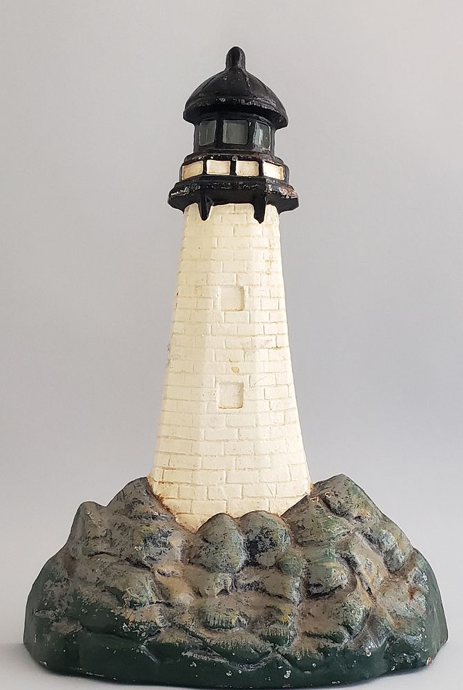 Appraisal: Oversized Cast Iron Lighthouse Doorstop Oversized Cast Iron Lighthouse Doorstop