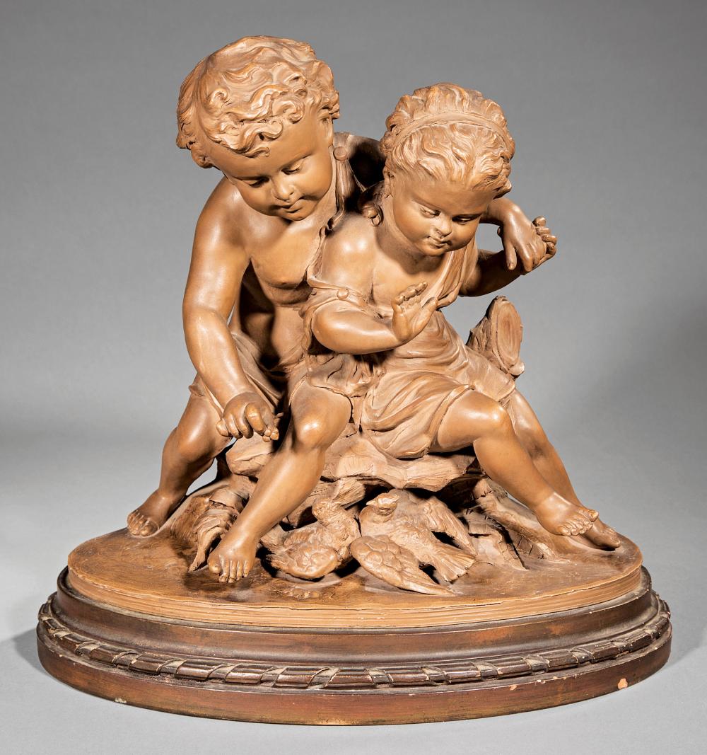 Appraisal: Terracotta Figural Group of Two Putti Playing after Gustave Trouillard