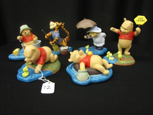 Appraisal: Six Pooh Porcelain Figurines including A Bounce a Day Sweeps