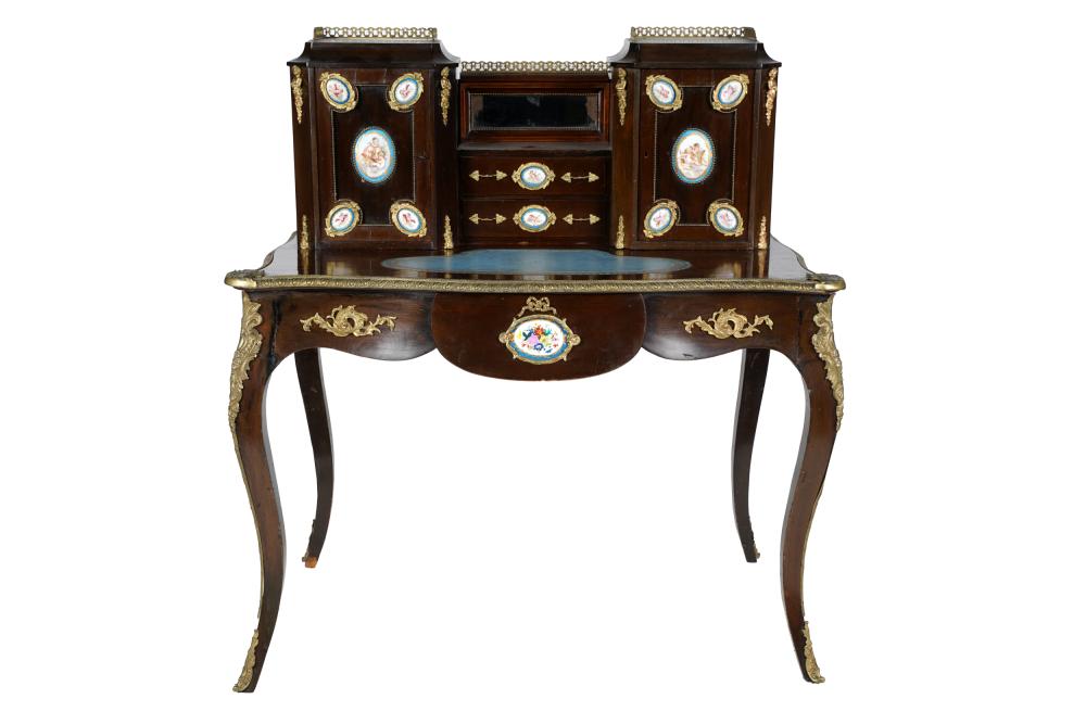 Appraisal: NAPOLEON III PORCELAIN-MOUNTED MAHOGANY BONHEUR DU JOURwith blue leather-inset top