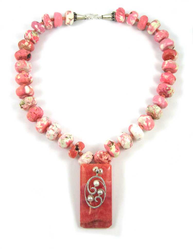 Appraisal: RHODOCHROSITE HOWLITE AND CORAL NECKLACE measuring - inches in length