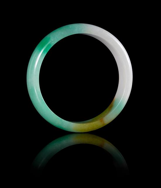 Appraisal: Sale Lot A Jadeite Bangle the semi-cylindrical stone of apple