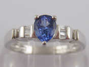 Appraisal: A white metal tests carat gold tanzanite and diamond ring