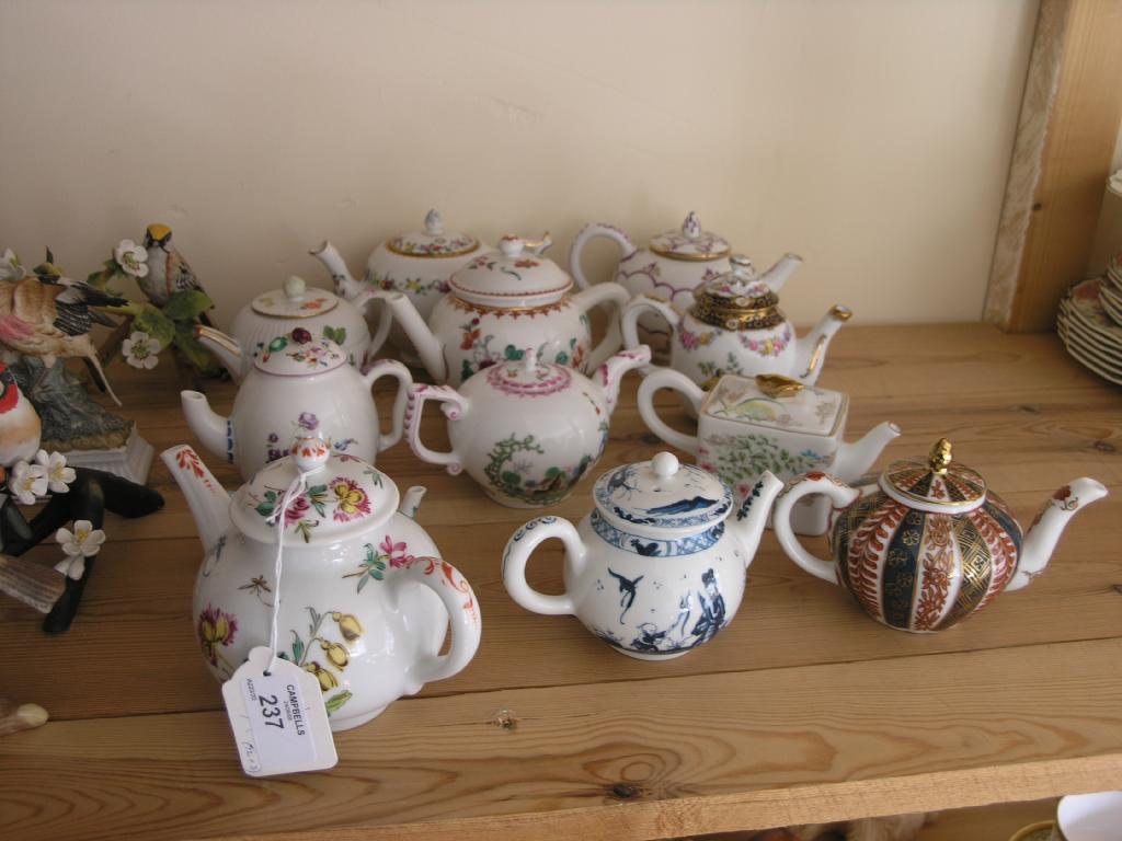 Appraisal: A collection of twelve porcelain teapots modern made by Franklin