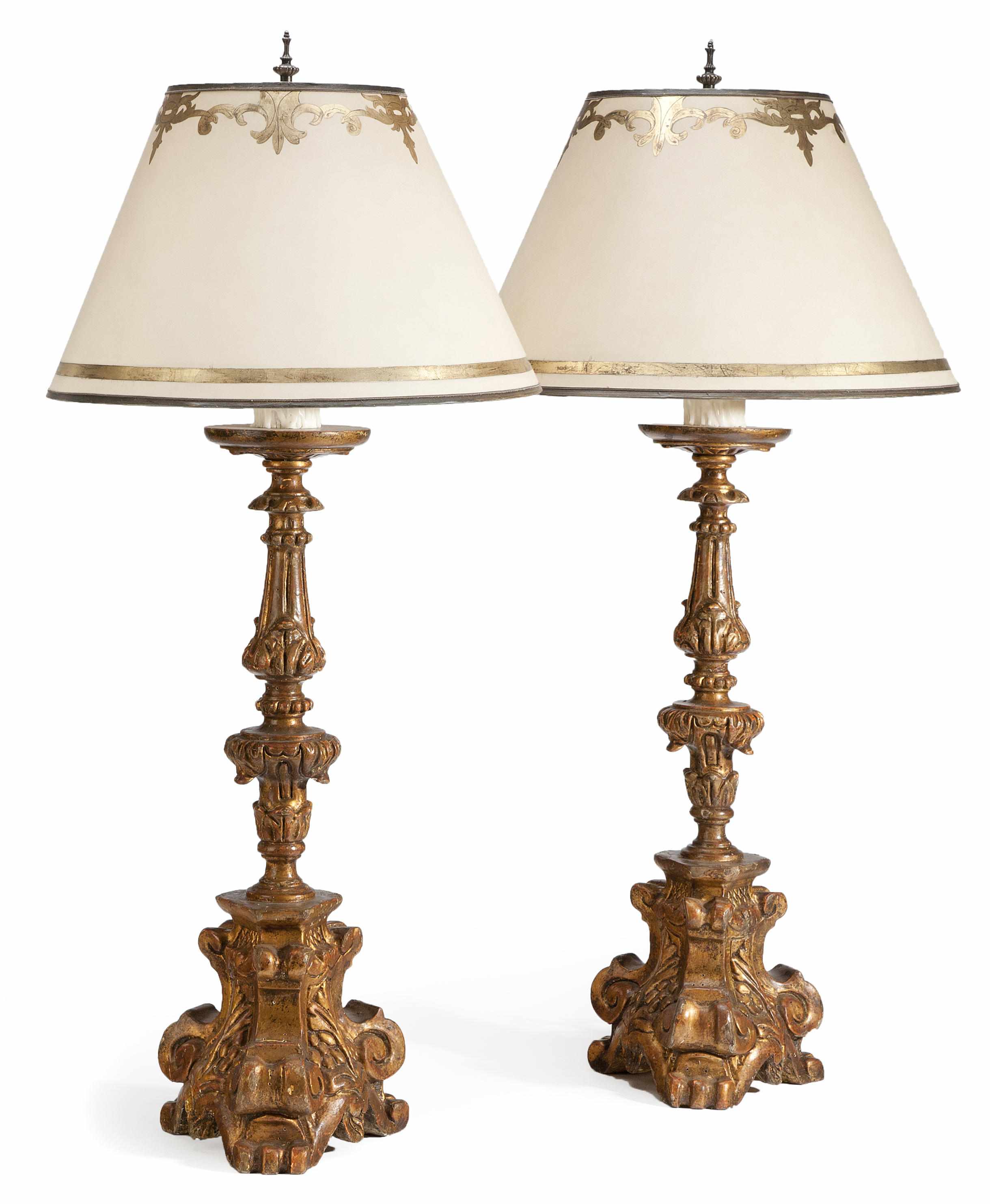 Appraisal: A pair of Italian Baroque style carved giltwood table lamps