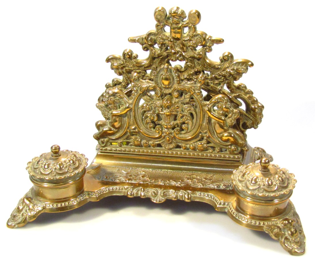 Appraisal: An early thC brass desk tidy the rococo designed body