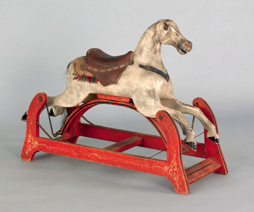 Appraisal: Painted hobby horse late th c with red stenciled platform