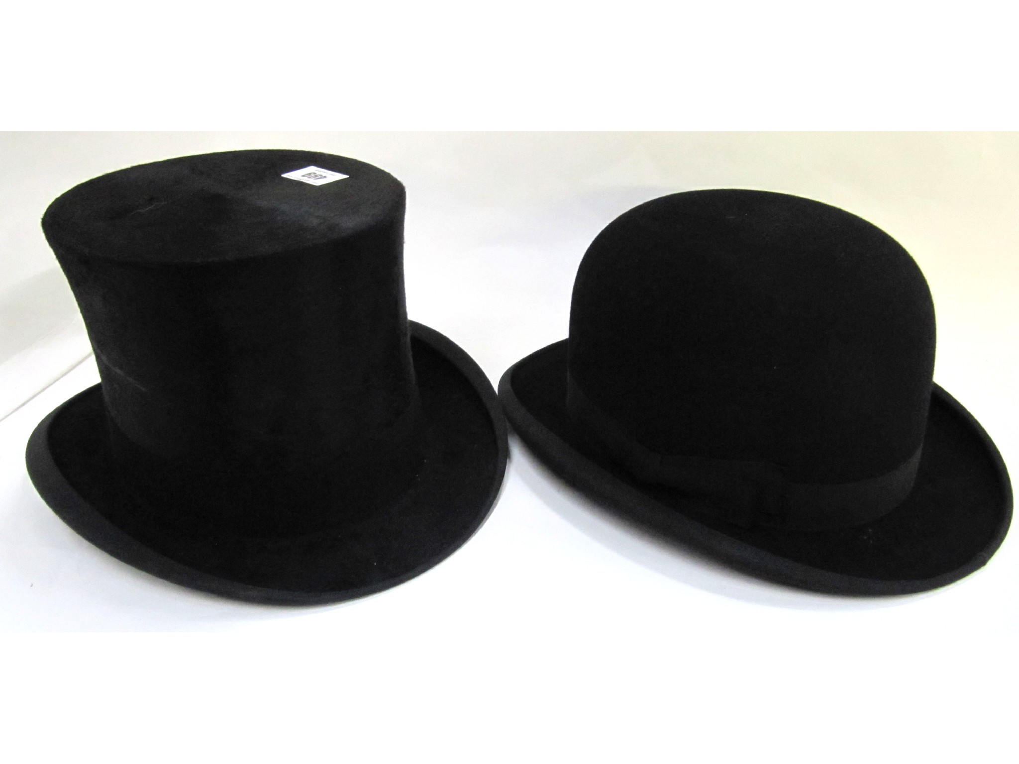 Appraisal: A lot comprising a top hat and a bowler hat