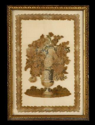 Appraisal: FRAMED AND CUT SAVONNERIE CARPET FRAGMENT Centered by a flower-filled