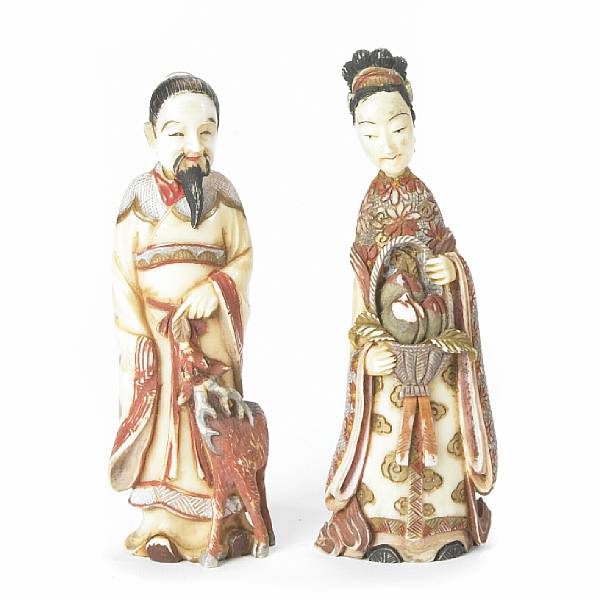 Appraisal: A pair of Japanese export painted ivory figural snuff bottles