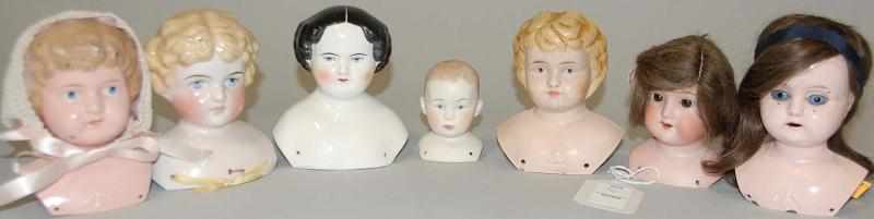 Appraisal: Seven Doll Heads Three are metal made in Germany Four