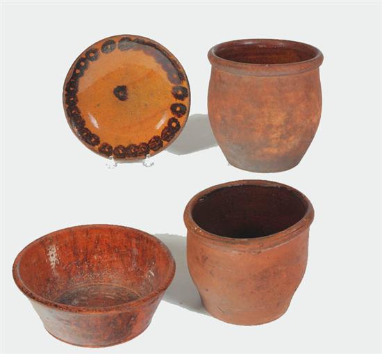 Appraisal: FOUR PIECES OF REDWARE American mid th century Two large