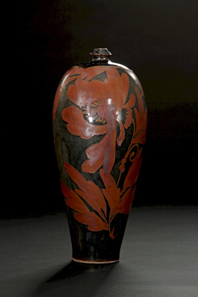 Appraisal: Cizhou Russet Painted Black-Glazed Meiping Vase The slender body gently