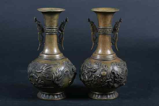 Appraisal: PAIR CHINESE BRONZE DRAGON VASES Qianlong four character mark Cast