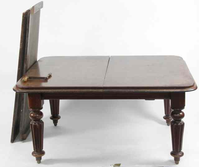 Appraisal: A Victorian mahogany extending dining table fitted two extra leaves