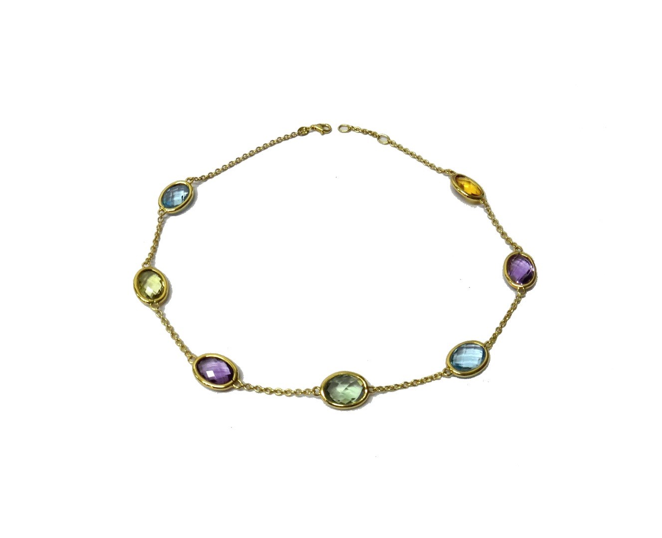 Appraisal: An ct gold and vary coloured gemstone set necklace by