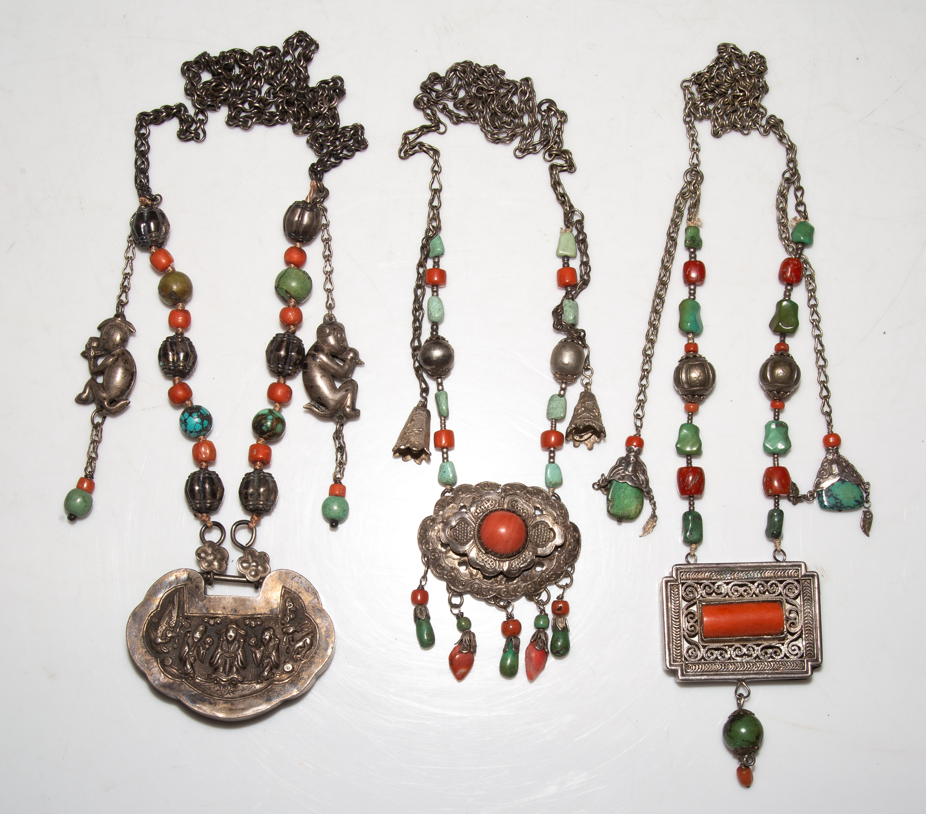 Appraisal: A COLLECTION OF CHINESE ANTIQUE SILVER NECKLACES Three Chinese silver