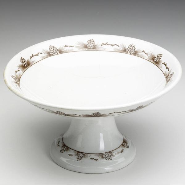 Appraisal: GUSTAV STICKLEY China compote printed with band of pinecones and