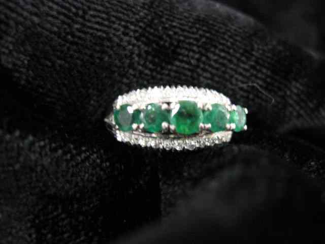 Appraisal: Emerald Diamond Ring row of rich emeralds totaling carat with