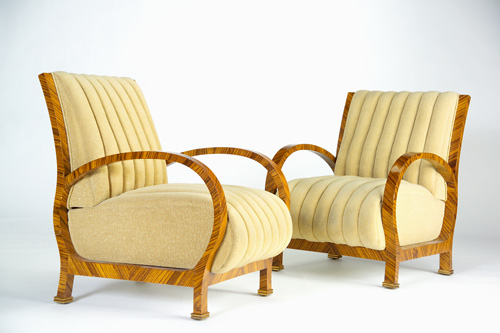 Appraisal: ITALIAN ART DECO Fine pair of armchairs with deeply-channeled beige