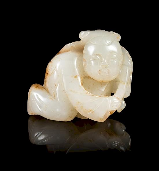 Appraisal: A White and Russet Jade Figure of a Boy Height