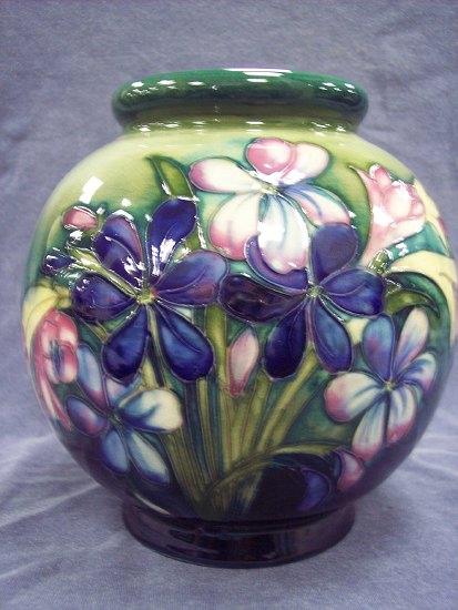 Appraisal: A Spring Flowers pattern spherical vase cm high marks blue