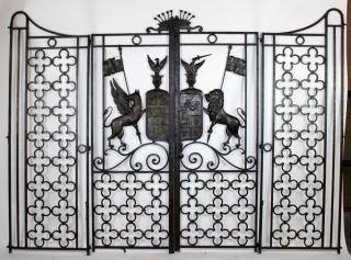 Appraisal: French forged iron entry gates with coat of arms with