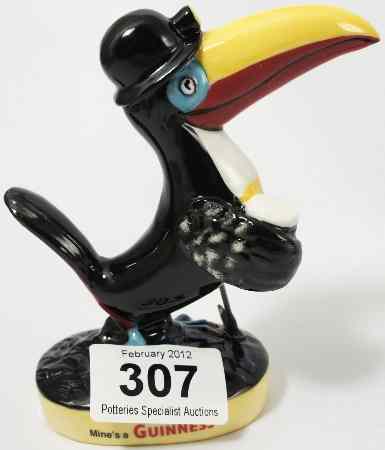 Appraisal: Royal Doulton Advertising Figure Guiness Miner Toucan MCL for Millennium