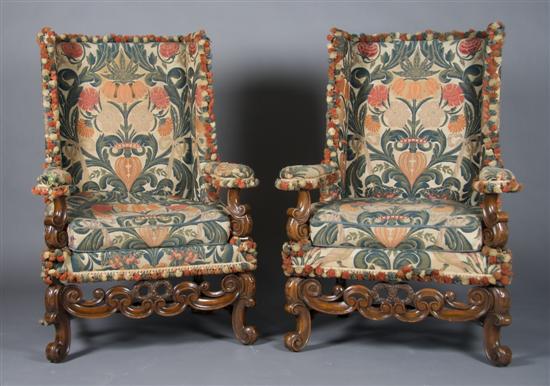 Appraisal: A Pair of Renaissance Revival Wingback Armchairs Height inches