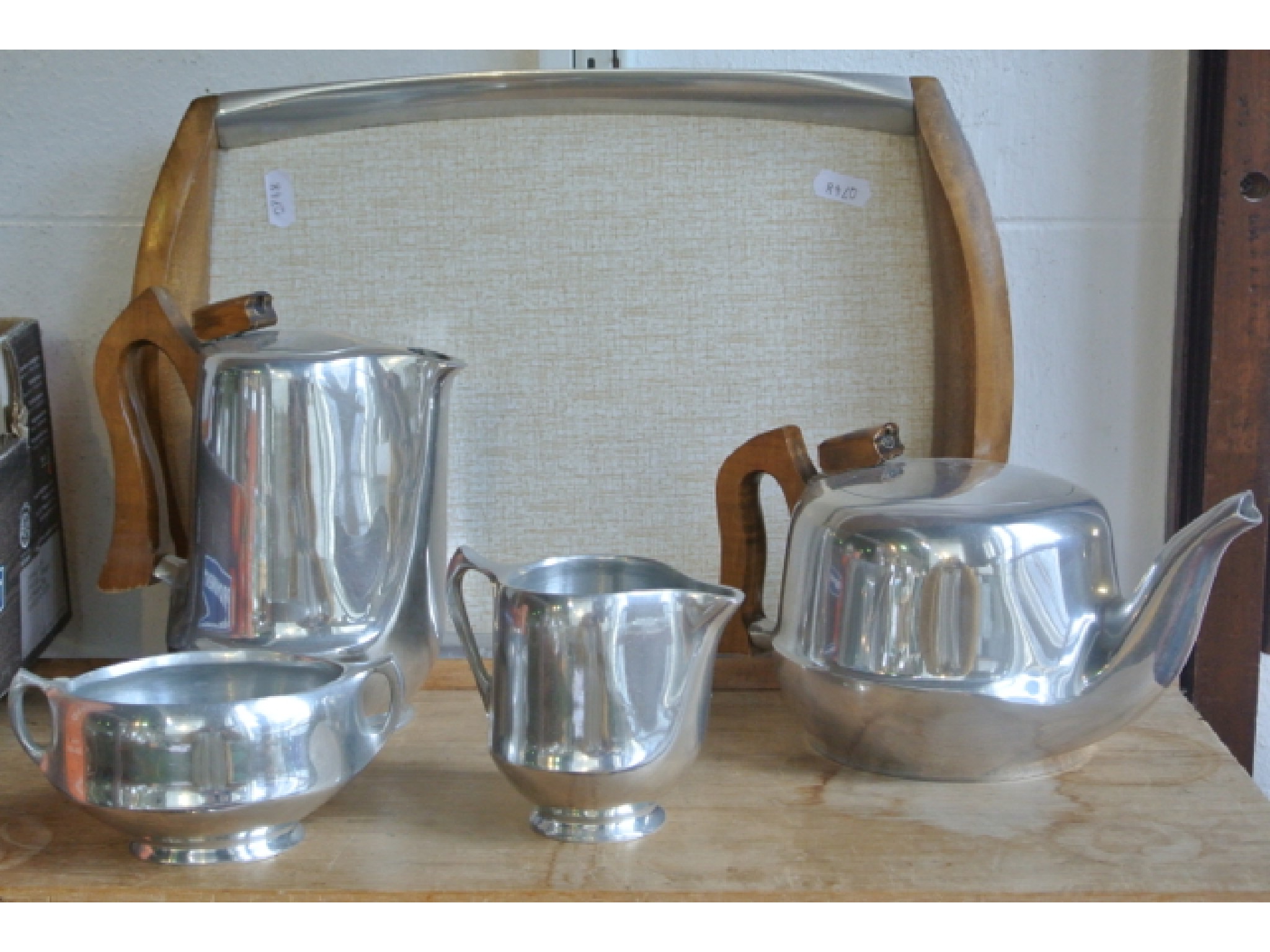 Appraisal: A Picquot tea set comprising teapot hot water pot two