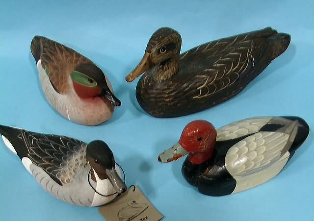 Appraisal: Group of resin decoys and wood decorative with opening back