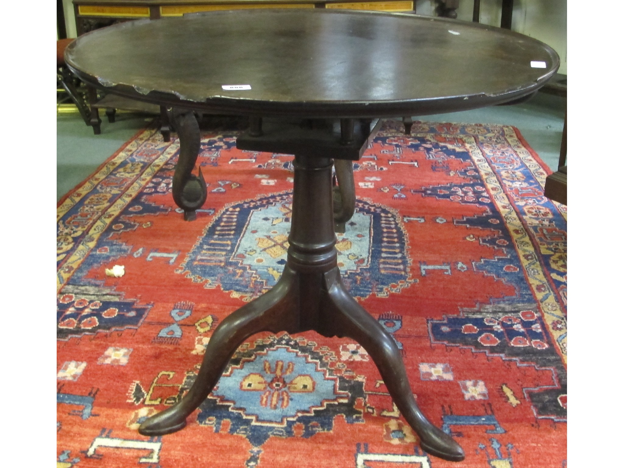 Appraisal: A George III mahogany tripod occasional table