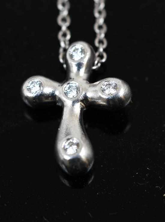 Appraisal: A diamond cross pendant by Tiffany Co Set with five