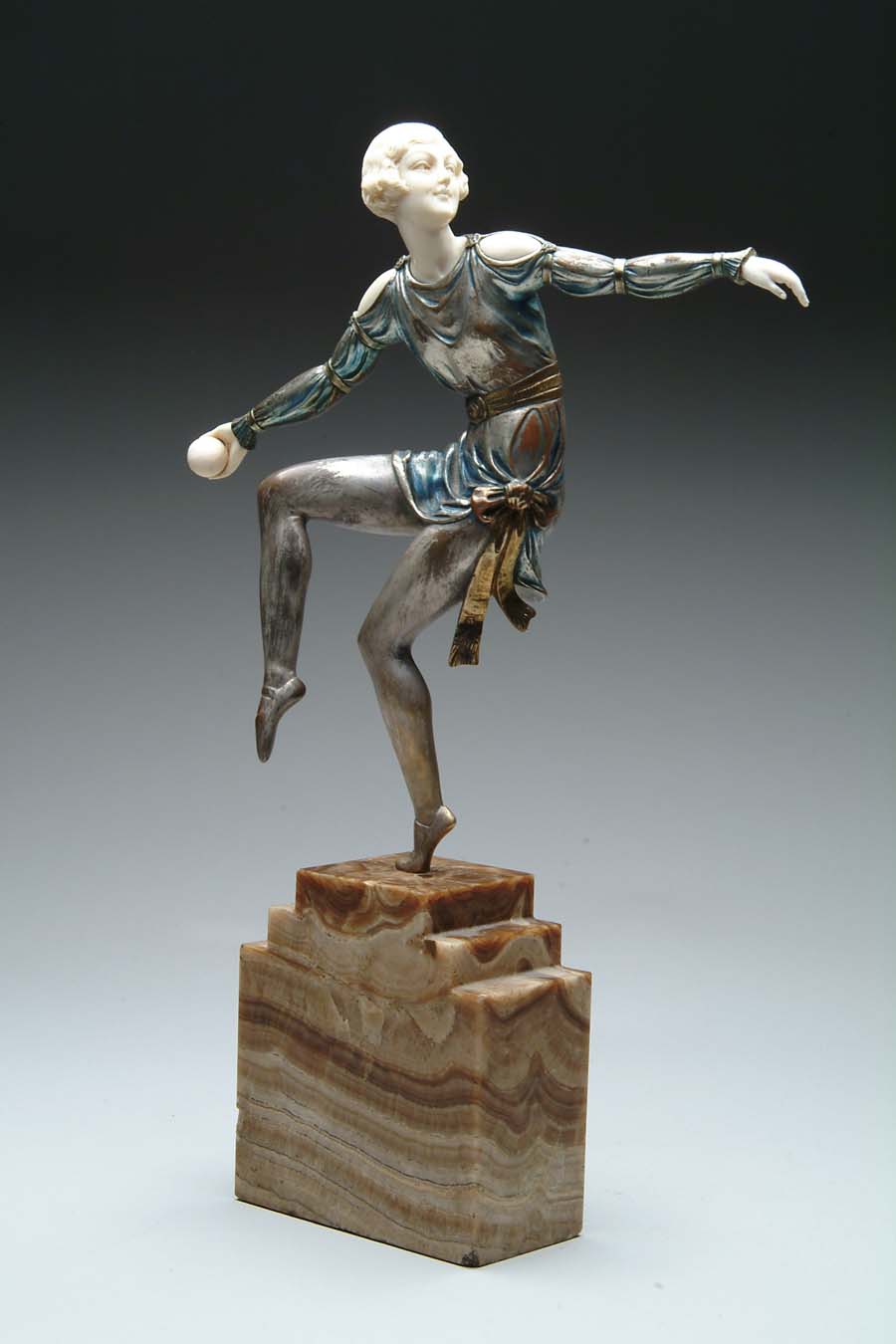 Appraisal: ART DECO BRONZE IVORY DANCER Fantastic Art Deco bronze depicts