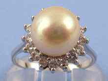 Appraisal: A white metal tests carat gold cultured pearl and diamond