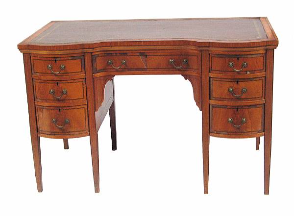 Appraisal: An Edwardian satinwood desk losses to veneer height in width