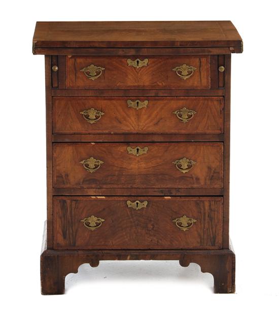 Appraisal: George III walnut bachelor chest last quarter th century hinged