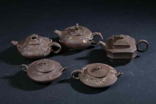 Appraisal: FOUR CHINESE YIXING TEA POTS Each with marker's mark of